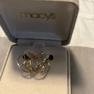 Gold hoops intertwine